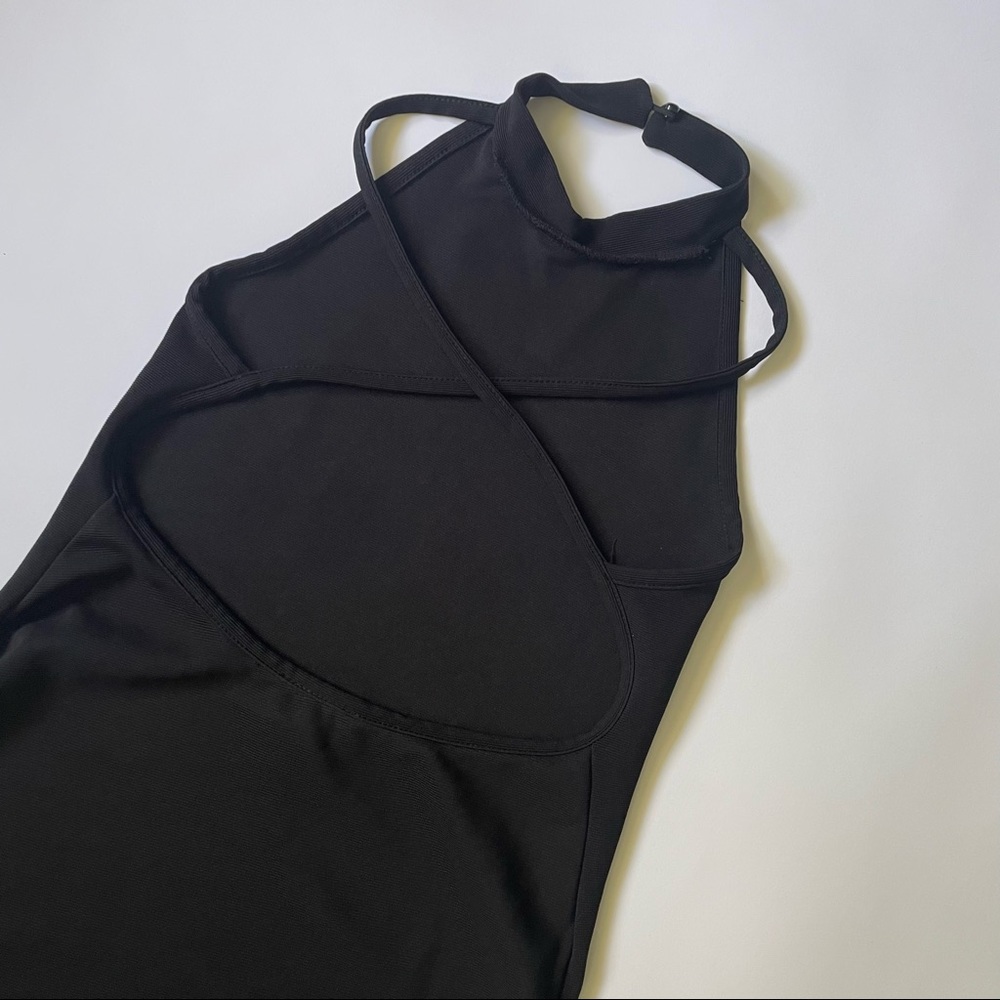 Little black dress. Midi backless dress.
